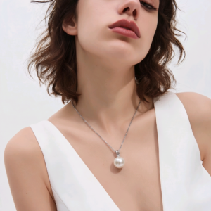 Perfect round freshwater pearl pendant with chain.