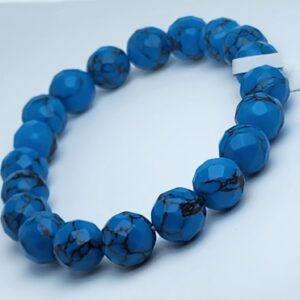 Faceted round turquoise howlite, stretchable bracelet.