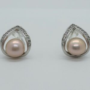 Teardrop stud earring, with cubic zirconia and pinkish freshwater pearl.